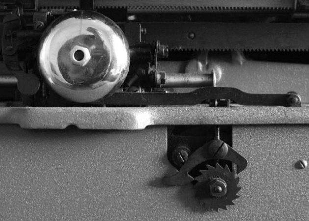 Exposed bell, escapement armature and motor spring pre-tensioner. Exposed bell, escapement armature and motor spring pre-tensioner.